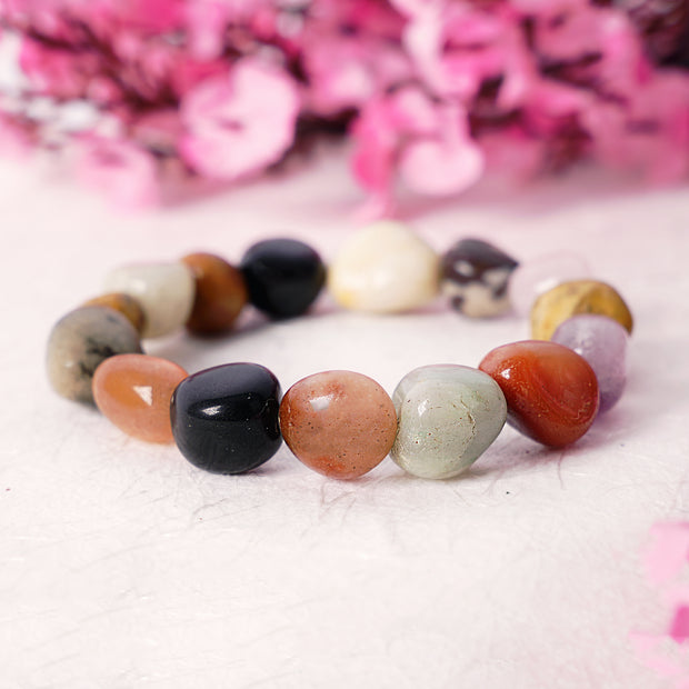 Chakra Luck & Prosperity Tumble Stone Bracelet Natural Stones: Amethyst • Rose Quartz • Carnelian • Green Aventurine • Black Obsidian • Howlite • Yellow Calcite • Labradorite • Jasper • Sunstone